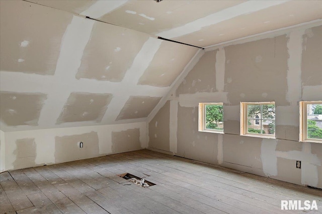 bonus room with vaulted ceiling