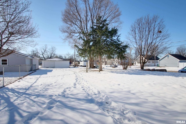 view of yard covered in snow