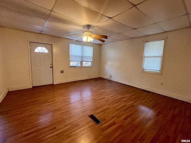 entryway featuring ceiling fan, dark hardwood / wood-style floors, and a paneled ceiling