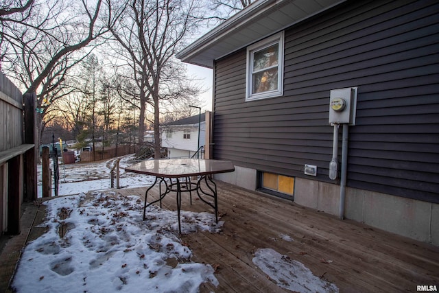 view of snow covered deck