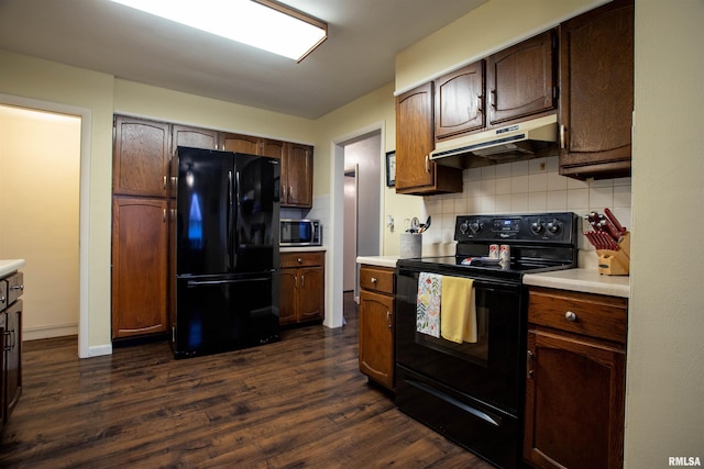 kitchen with dark wood-type flooring, backsplash, dark brown cabinetry, and black appliances