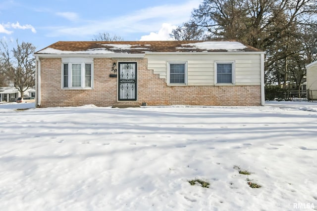 view of front of property with brick siding