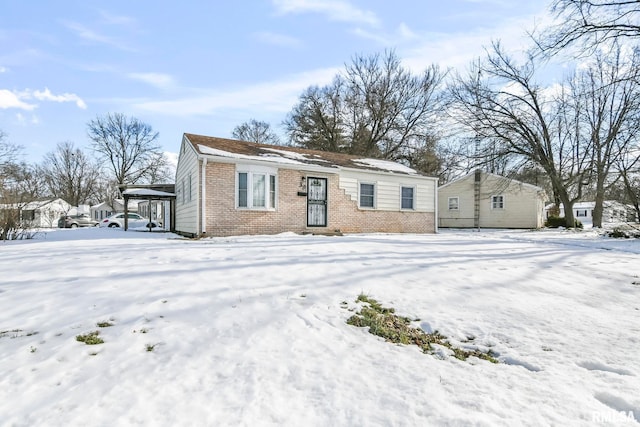 view of front of home with brick siding