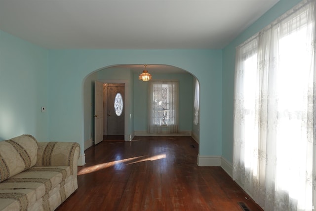 living room with dark wood-type flooring