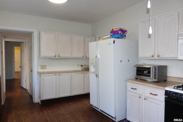 kitchen with white cabinetry, white appliances, dark hardwood / wood-style flooring, and hanging light fixtures