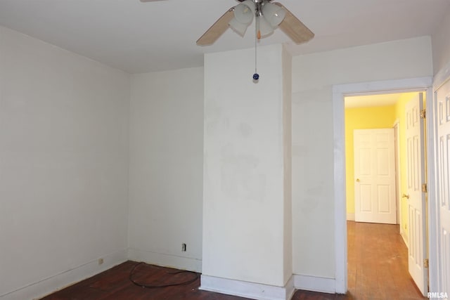 unfurnished room featuring ceiling fan and hardwood / wood-style flooring