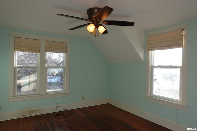 bonus room featuring ceiling fan, a wealth of natural light, and lofted ceiling