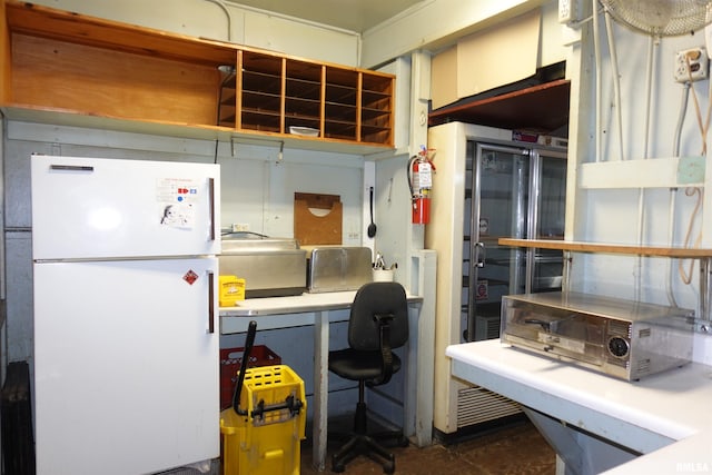 kitchen featuring white fridge