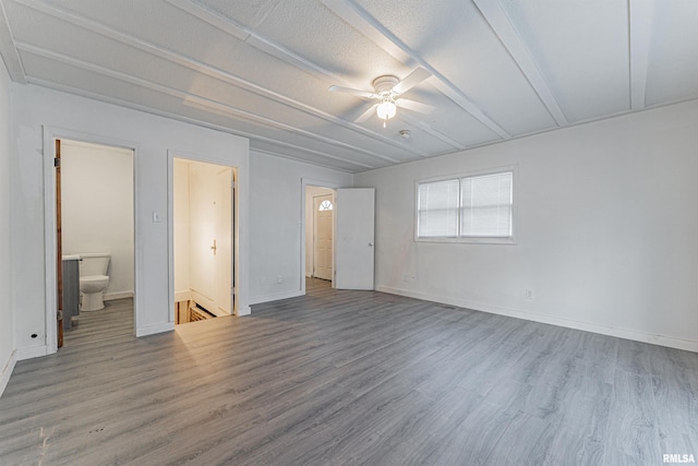 unfurnished bedroom featuring ceiling fan, connected bathroom, and light hardwood / wood-style floors