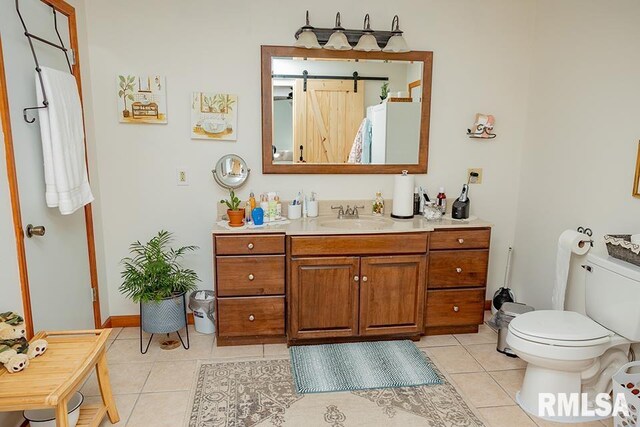 laundry area with independent washer and dryer and hardwood / wood-style flooring