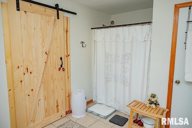 bathroom featuring walk in shower and tile patterned floors