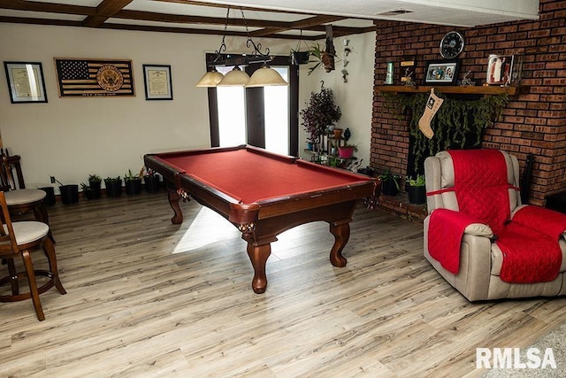 rec room featuring hardwood / wood-style flooring, pool table, and beamed ceiling