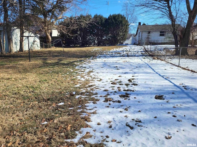 view of yard covered in snow