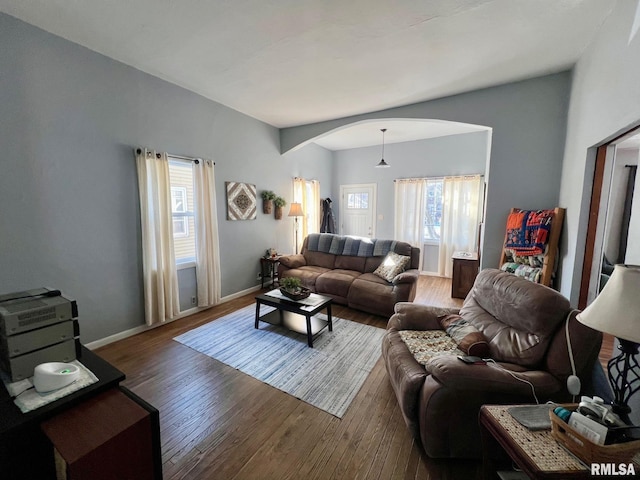 living room with dark hardwood / wood-style floors