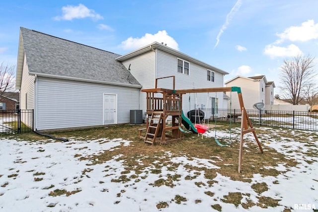 snow covered playground with cooling unit