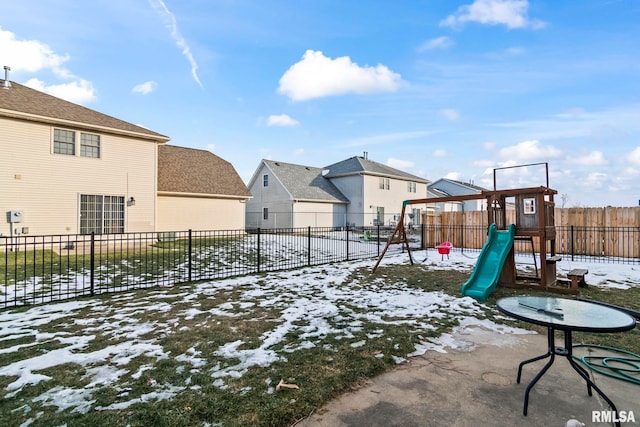 view of snow covered playground