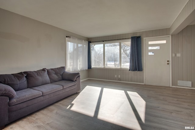 living room with light hardwood / wood-style flooring