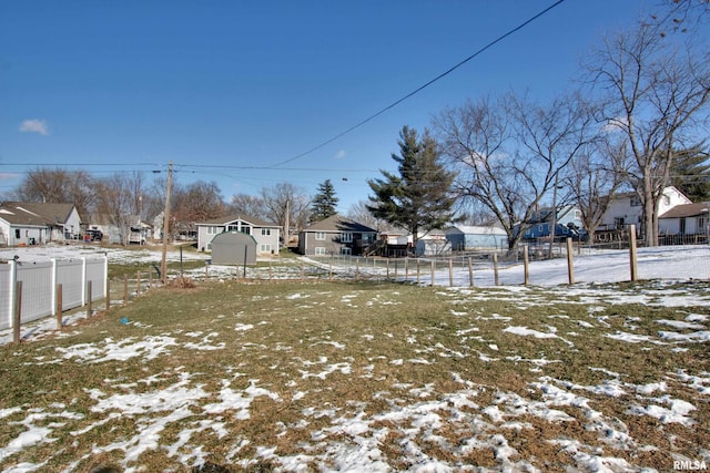 view of yard covered in snow