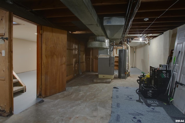 basement with heating unit and gas water heater