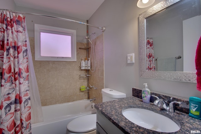 full bathroom featuring toilet, vanity, and shower / bath combination with curtain