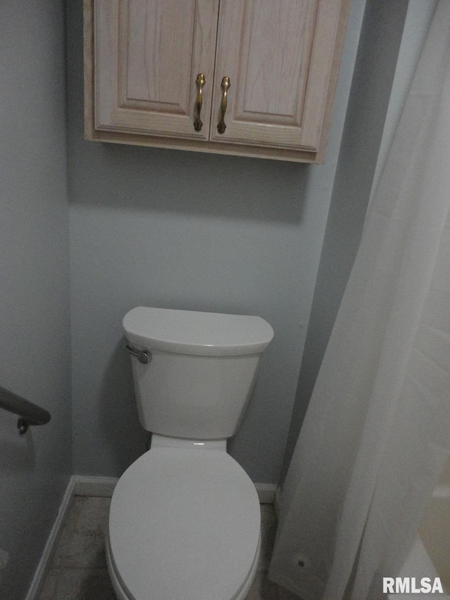 bathroom featuring toilet