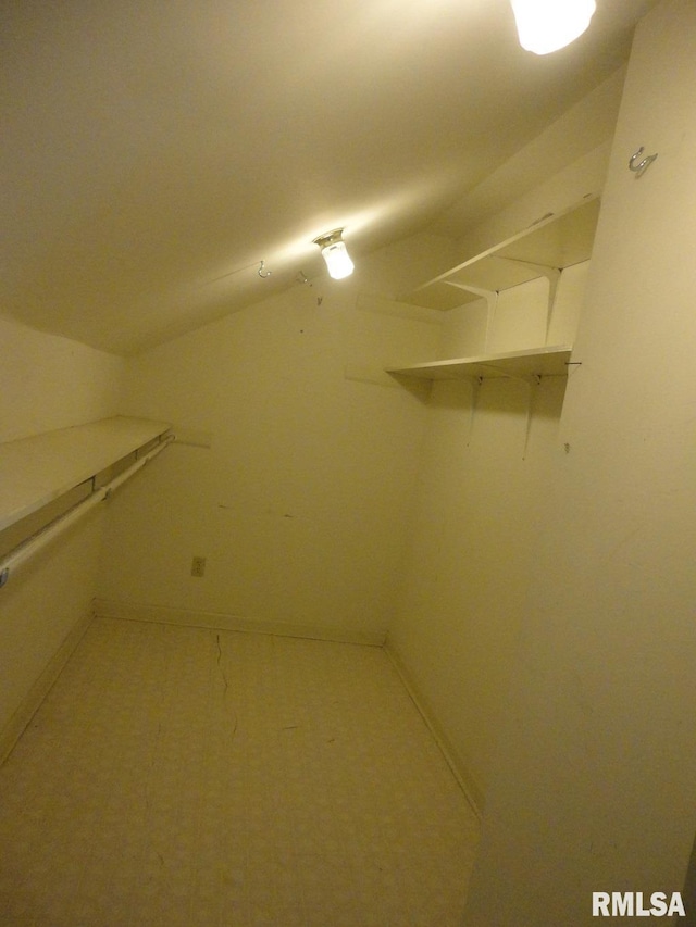 spacious closet with lofted ceiling