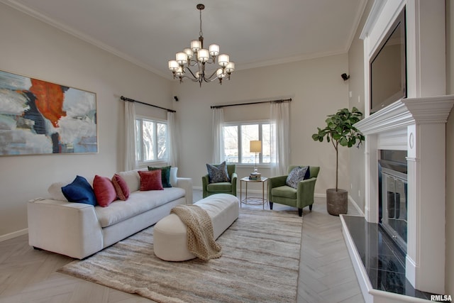 living room with light parquet floors, ornamental molding, and an inviting chandelier