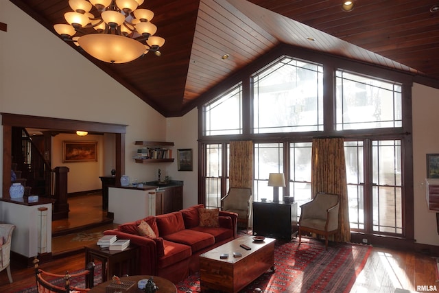 living room with hardwood / wood-style floors, wooden ceiling, high vaulted ceiling, and a notable chandelier