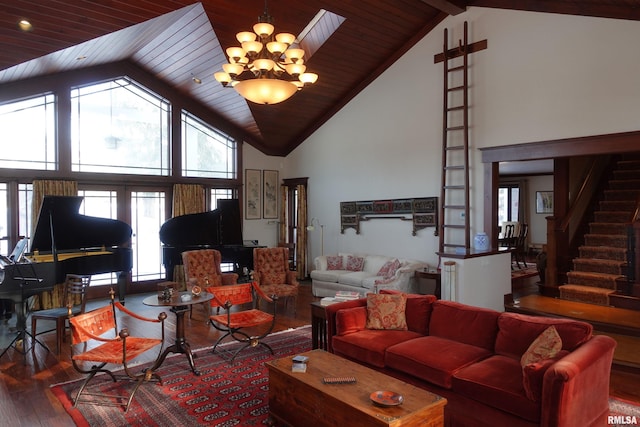 living room featuring beamed ceiling, wood-type flooring, french doors, high vaulted ceiling, and an inviting chandelier