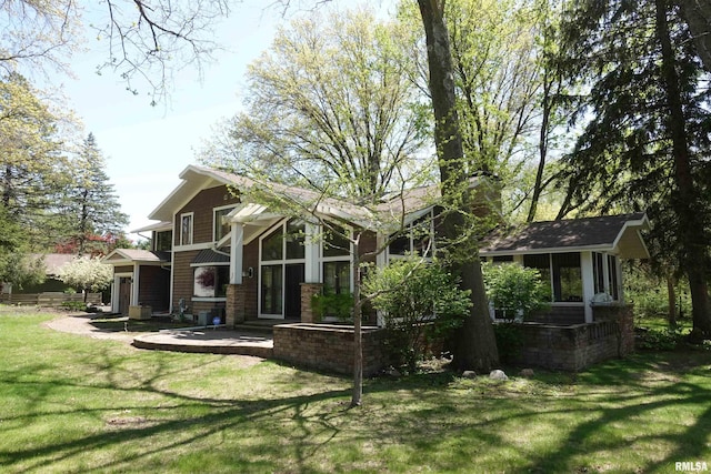 128 N Soangetaha Rd, Galesburg, IL 61401 - rear view of house with a lawn