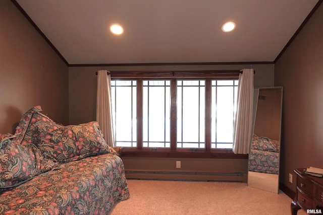 bedroom featuring light colored carpet, baseboard heating, multiple windows, and crown molding