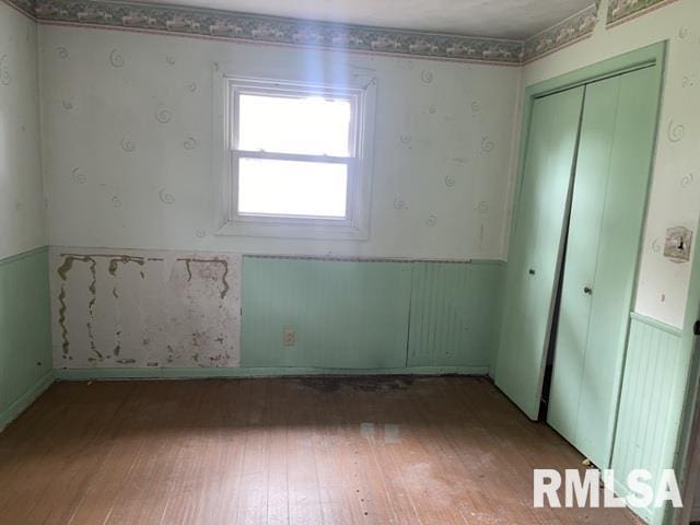 empty room featuring hardwood / wood-style flooring