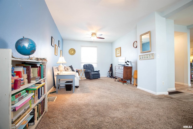 miscellaneous room with ceiling fan and carpet floors