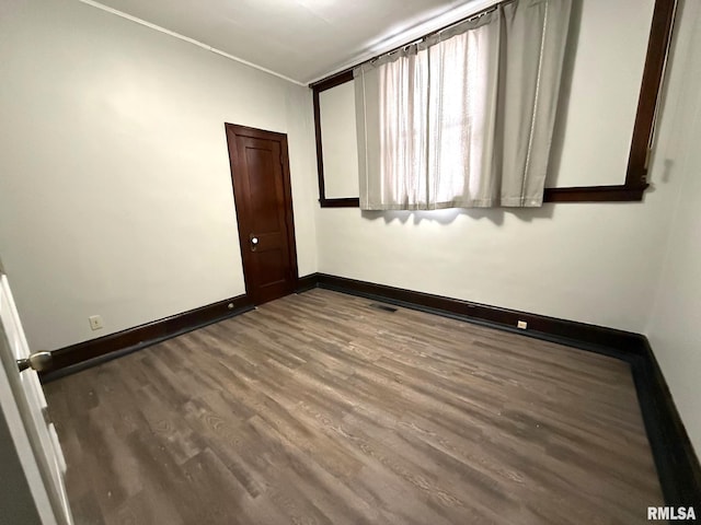 unfurnished bedroom featuring wood-type flooring