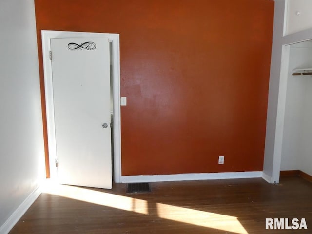 interior space with dark wood-type flooring