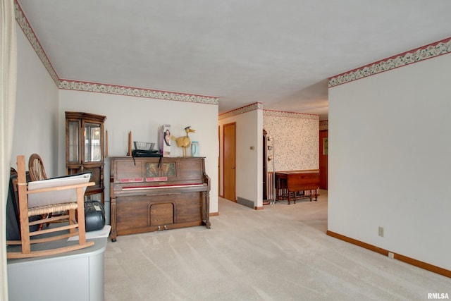 living area with light colored carpet