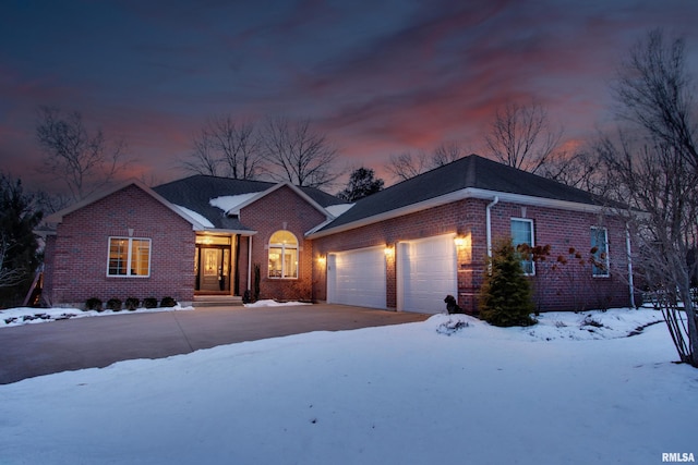 single story home featuring a garage