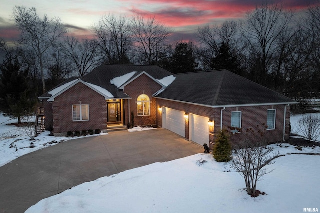 ranch-style home with a garage