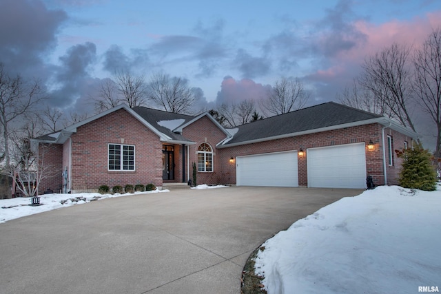 single story home with a garage