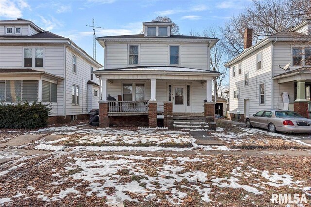 front of property featuring a porch