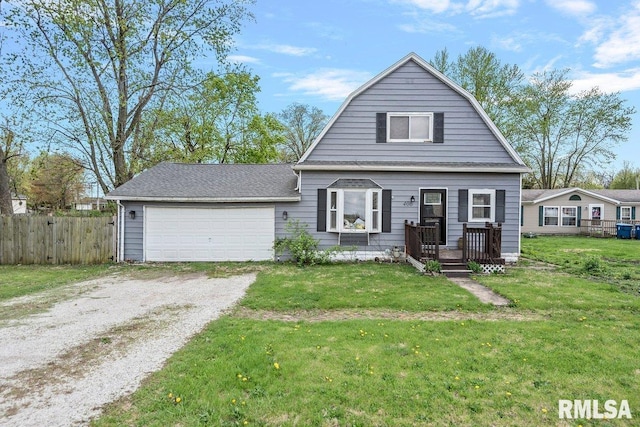 406 W Elm St, Buffalo, IL 62515 - dutch colonial with fence, a front lawn, driveway, and a garage