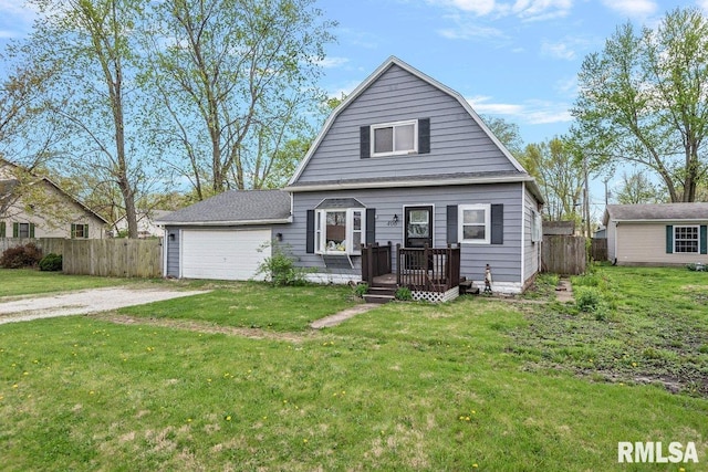 406 W Elm St, Buffalo, IL 62515 - dutch colonial with a front lawn, fence, an attached garage, a gambrel roof, and dirt driveway