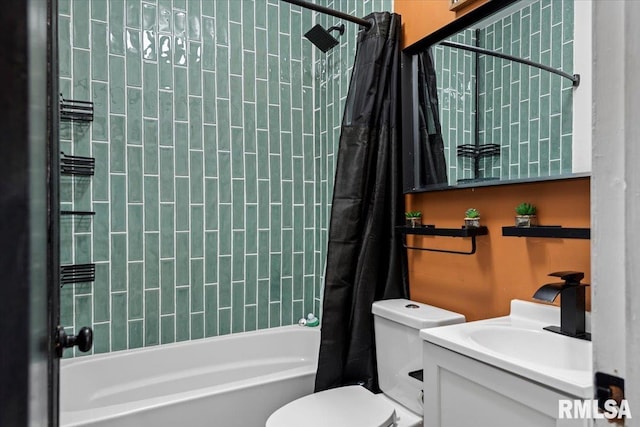 full bathroom featuring toilet, vanity, and shower / tub combo