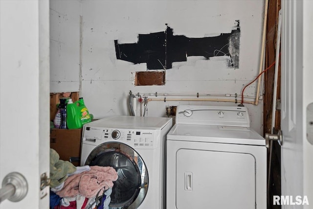 laundry area with washer and clothes dryer