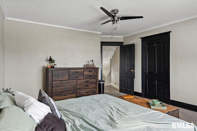 carpeted bedroom with ceiling fan and ornamental molding