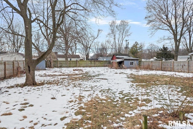 view of yard covered in snow