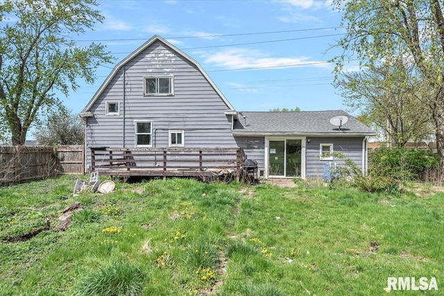 406 W Elm St, Buffalo, IL 62515 - rear view of property featuring a yard, fence, and a deck