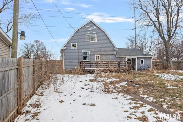 view of snow covered house