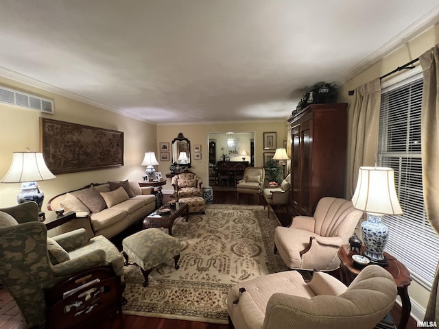 living room featuring hardwood / wood-style floors and crown molding