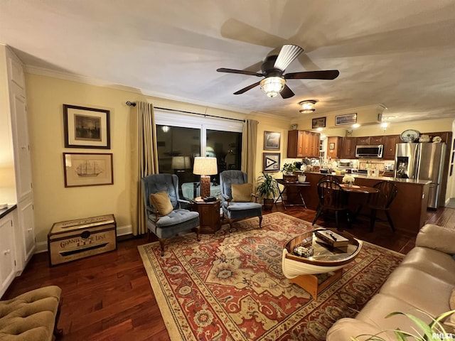 living room featuring ceiling fan, crown molding, and dark hardwood / wood-style floors